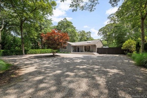 Effortlessly stylish and perfectly located, this four bedroom, three bath modern Hamptons home offers the ultimate East End escape just minutes to East Hampton Village and pristine ocean beaches.