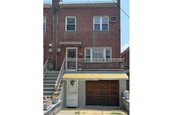 Welcome to 2896 Coddington AvenueSemi-detached brick home with front porch, garage and driveway