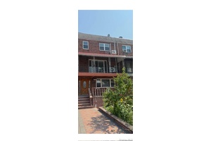 This large Two family townhome is a designer's special that needs a 203k loan for its finishing touches.