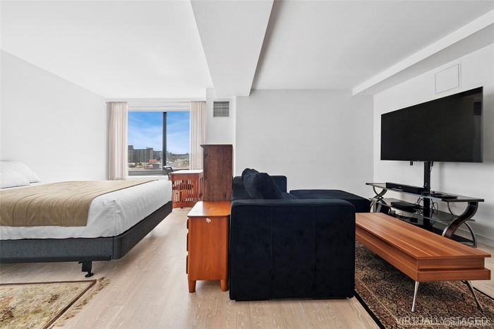 Bedroom with light wood-style flooring