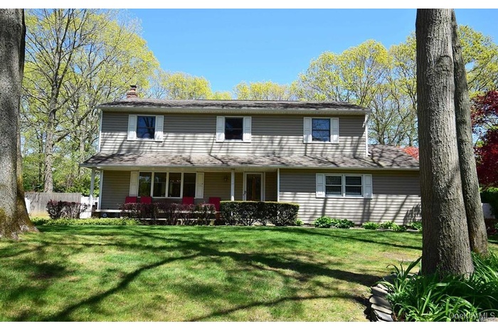 Front of house featuring covered porch