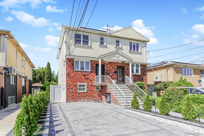 Traditional home with brick siding