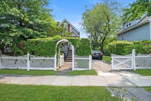 1906 is a single family home built in 1920 with two stories and an Extra Lot Used as a Yard.