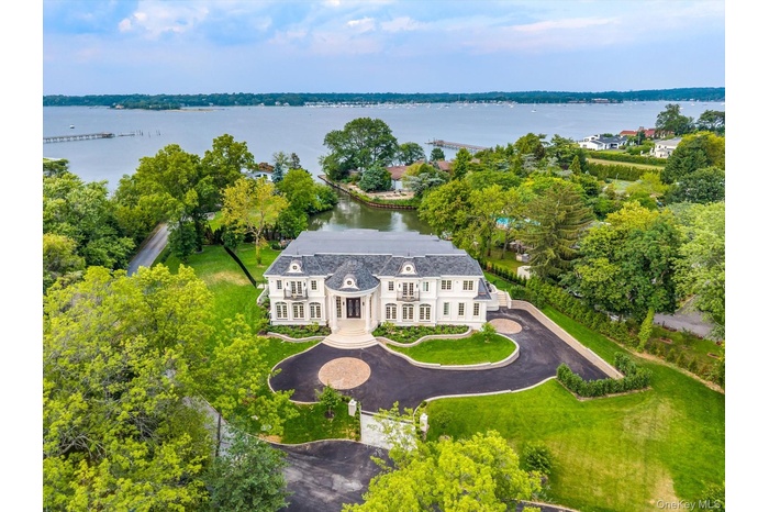View from above of property with a large body of water