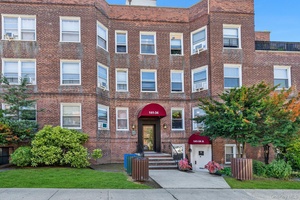 This well maintained 3 bedroom unit features brand new hardwood floors, an efficient kitchen, and a spacious living room dining room area, perfect for comfortable living.