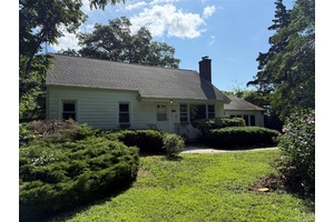 This beautifully expanded Cape Cod offers a perfect blend of comfort and functionality.