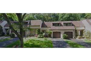 Southern facing, spacious, light filled, and private townhouse featuring sleek black hardwood flooring throughout.