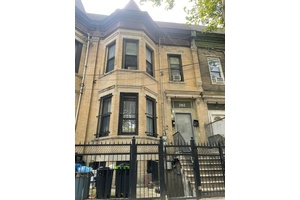 Large brick fully renovated multi family in the Longwood section featuring two 3 bedroom apts and a studio apt.