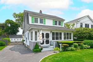 Welcome Home to this Enchanting Dutch Colonial featuring a delightful Enclosed Front Porch, Living room, large Formal Dining room, Kitchen, Mud room, 1 2 bath and a beautiful Family room ...