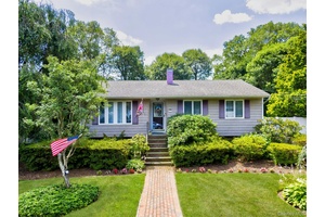 Welcome to this impeccably maintained and renovated 4 bedroom, 2 bath home in the desirable Comsewogue School District, nestled on a spacious third acre lot in beautiful Port Jefferson Station.