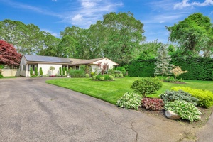 Welcome to this beautifully maintained 3 bedroom, 2 bathroom ranch style home, perfectly set on a spacious.