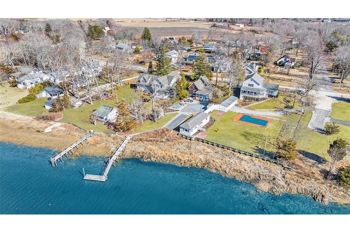Aerial view with a water view and a residential view