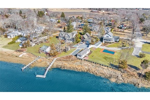 Discover the perfect North Fork waterfront escape with this stunning home, offering serene views of Mattituck Inlet Creek.