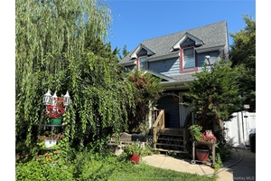 4 bedroom, 3 bath home featuring a spacious layout and a full finished basement, perfect for entertaining or additional living space.