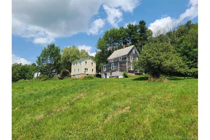 View of yard with view of scattered trees
