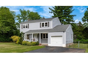 Step into this completely renovated and updated side hall Colonial in the heart of South New City, where modern design meets timeless charm.