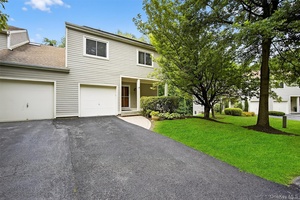 Nestled in the tranquil Wildflower Hills community, this spacious end unit townhouse offers nearly 2, 000 sq ft of living space across three well appointed levels with an attached garage.