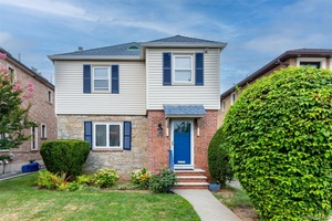 Welcome to this beautifully maintained Colonial residence, ideally located in the heart of Fresh Meadows.