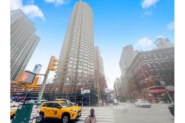 View of building exterior with a city view
