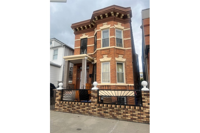 Italianate house with brick siding