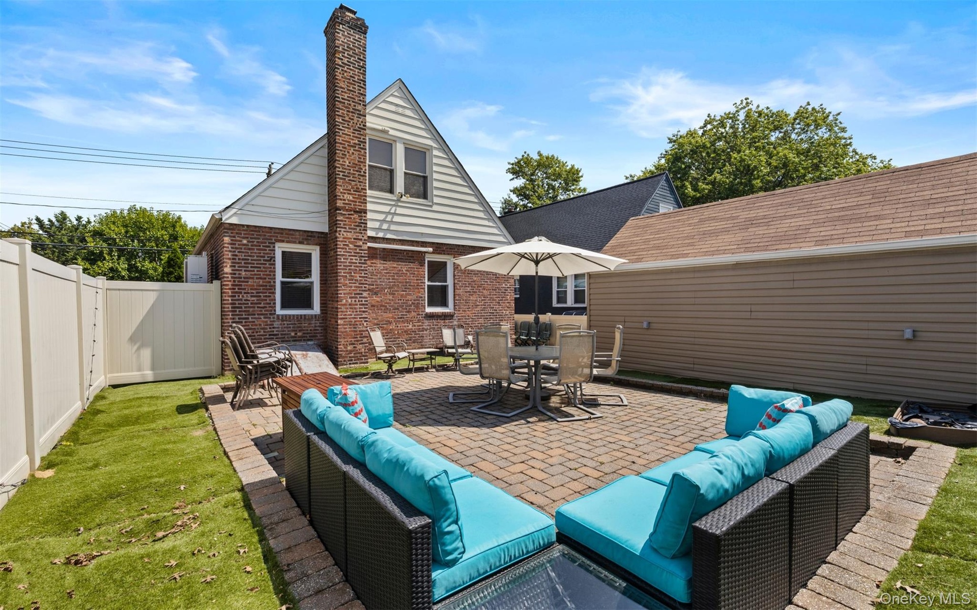 View of patio featuring an outdoor living space and outdoor dining area