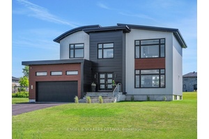 Welcome to this exceptional custom built, automated home, crafted with precision and modern elegance.