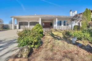 A stately amp ; spacious residence nestled in a well established neighbourhood with tree lined streets.