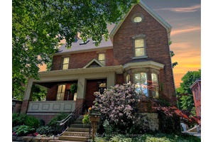 Historic elegance meets modern comfort in this beautifully renovated 1890s red brick home on one of Owen Sounds most prestigious streets.