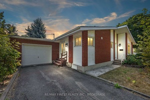 Welcome to this centrally located 3 2 bedroom, 2 bath bungalow with an attached garage, tucked away on a quiet street in Calvin Park.