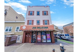 Prime investment opportunity in the vibrant Corona neighborhood, this property features three residential apartments, one commercial space, a basement and a two car driveway.