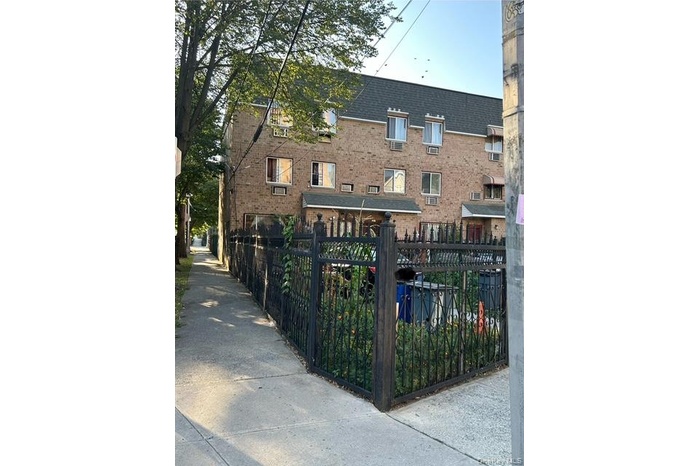Gate with a fenced front yard