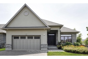 Welcome to this stunning premium end unit bungalow in the exclusive Ridge at Byron offering unmatched privacy, security, and meticulous care in a highly sought after enclave.