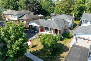 Backing onto greenspace in the sought after Perry Glen Estates, 597 Walsh Drive offers the perfect blend of privacy, beauty, and convenience.