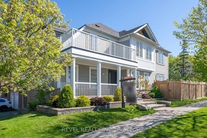 Spectacular Lakeside Living Backing onto walking path and green space.