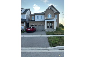 This 4 bedroom, 4 bath detached home delivers the rare blend of upscale design and private natural beauty.
