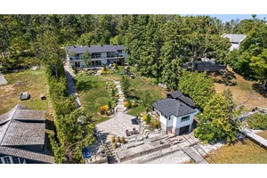 On a quiet, tree lined crescent, this turnkey brick bungalow offers an exceptional lifestyle on one of Lake Simcoes most sought after stretches of shoreline.