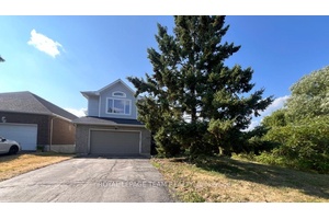 This beautiful 5 bedroom, walk out basement single family home is the epitome of luxury living.