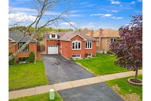 Charming All Brick Raised Bungalow with In Law Suite.