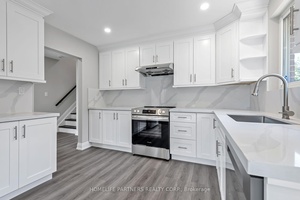 Must see ! ! ! Beautiful 3 bedroom property boasts a gorgeous chef's kitchen with quartz counter top and backsplash, high end stainless steel appliances and luxury vinyl flooring.