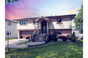 Tucked away on a quiet cul de sac in Baldwin Harbor, this exquisite waterfront residence offers a rare blend of elegance, comfort, and modern innovation.