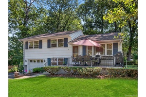 Nestled on a quiet, tree lined block in sought after Suffern, this beautifully maintained split level home is truly move in ready.
