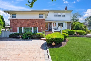 Over 2800 square foot expanded and dormered 4 bedroom split, Tremendous living space includes living room, formal dining room, eat in kitchen and family room.