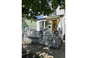 Single Family with extra separate lot.