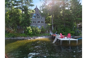 Welcome to 146 Beck Shore Road, a rare and exceptional waterfront gem nestled on the serene shores of Mississippi Lake, just minutes from historic downtown Perth.