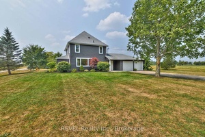 Situated on two acres in one of the most gorgeous, yet convenient locations, 13717 Ort Road offers country living without compromise !