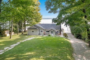 Top 5 Reasons You Will Love This Home 1 Unique waterfront property offering a haven of serenity, combining peaceful ambiance with enjoyable features, including its own private beachfront with 102' ...