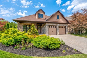 Welcome to this stunning custom built bungalow by Kenneth Homes, perfectly positioned in the upscale St.