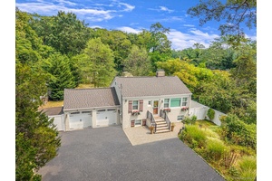 Welcome to this beautifully renovated 2 Bedroom, 2 Bathroom home situated on an expansive 1.