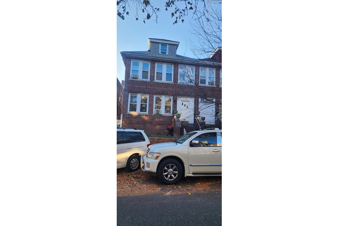 View of front of house featuring brick siding