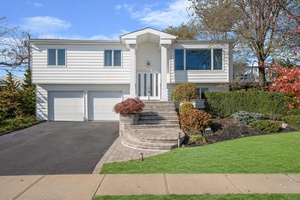 Newly Renovated amp ; Updated South Merrick 4 Bedroom, 3 Full Bath Hi Ranch Situated On A Oversized Corner Lot !